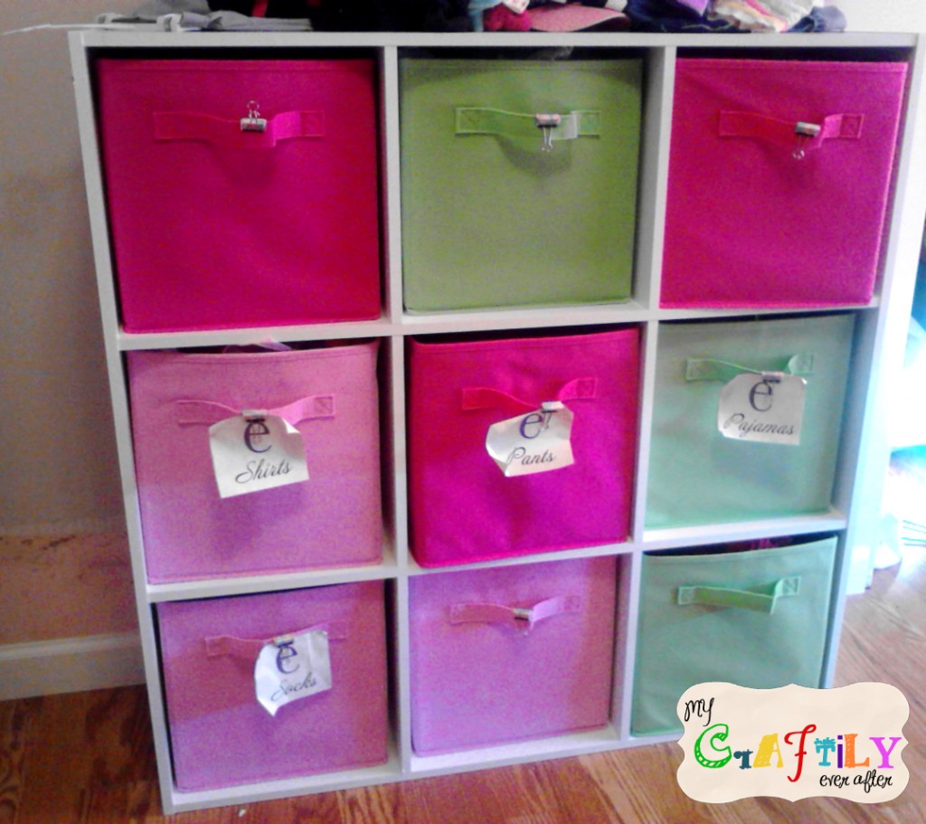 girls bedroom clothes storage pink and green