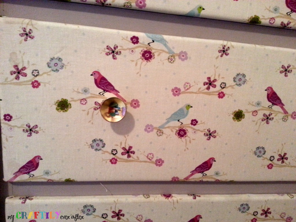 fabric covered dresser drawers close up