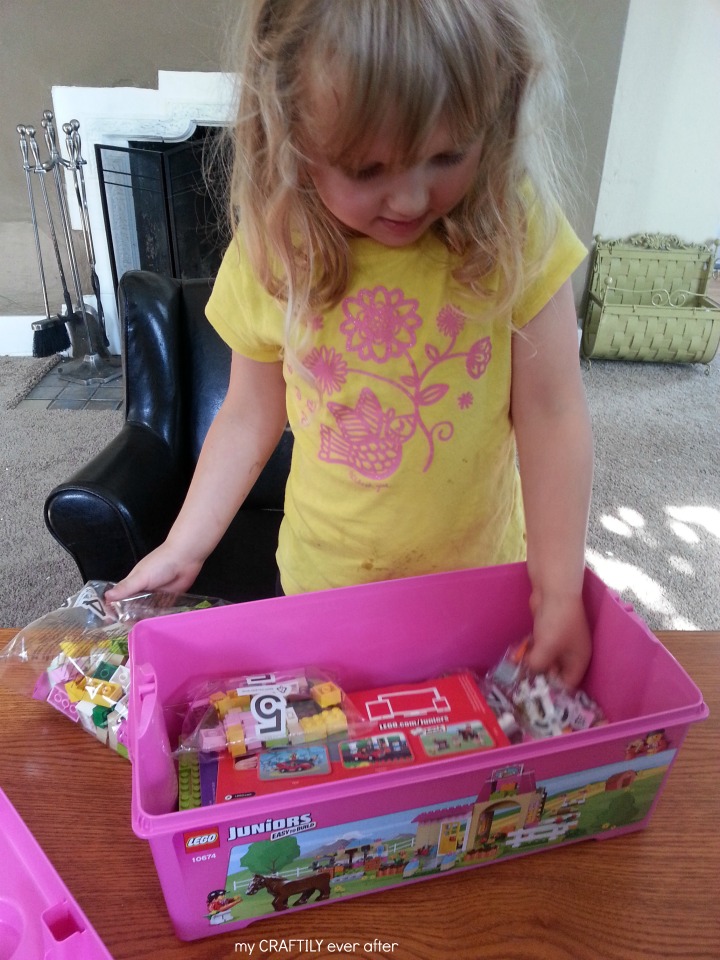 opening up her LEGO juniors