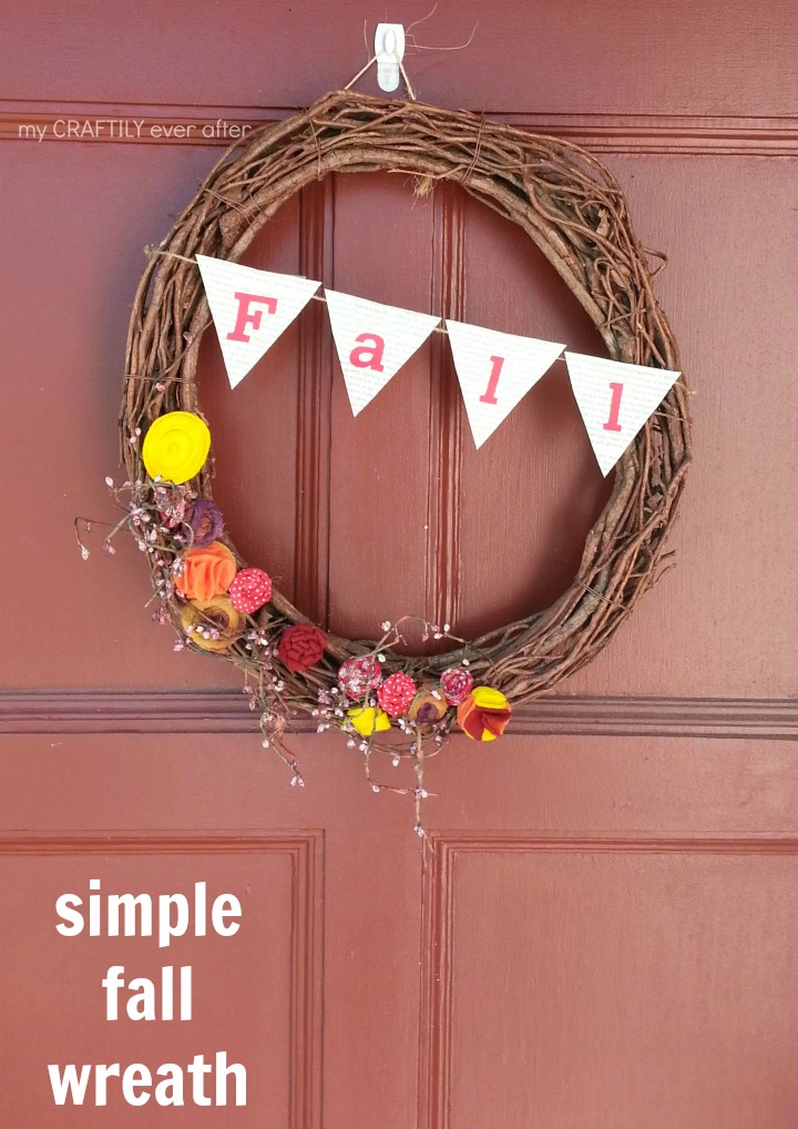 simple fall wreath on the front door