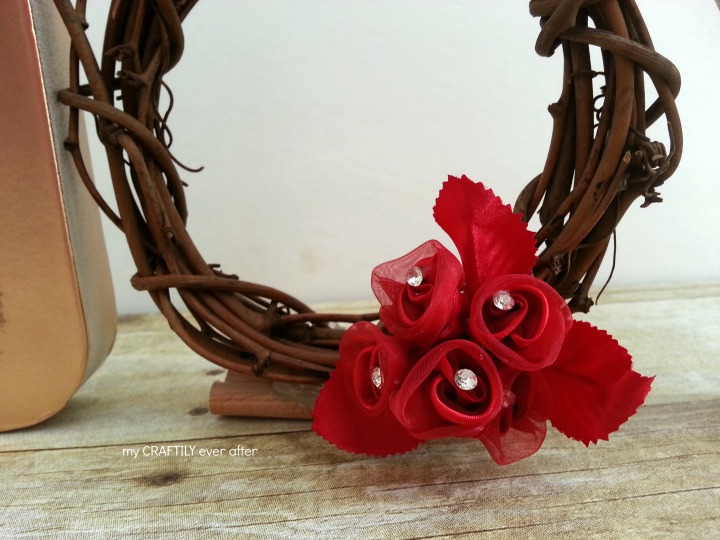 hot glued flowers to small wreath