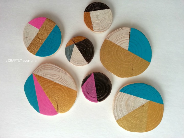 ornaments made from wood slices with paint