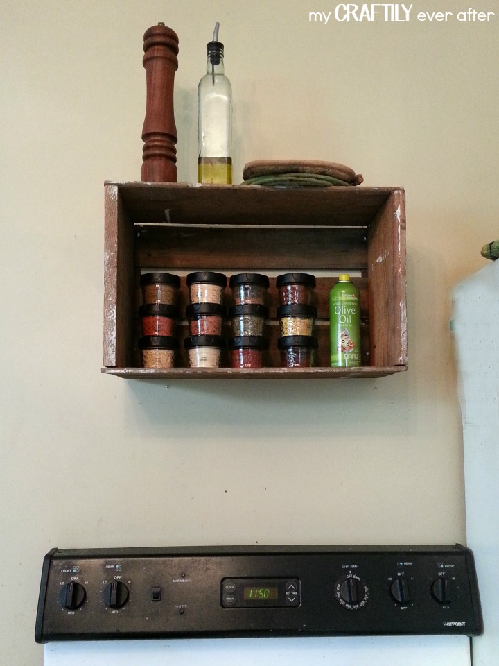 Using a funky old crate for a spice rack in the kitchen
