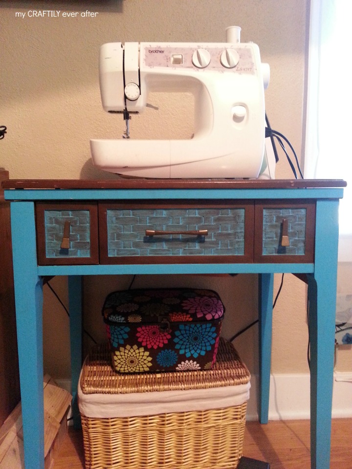 vintage sewing table in craft room