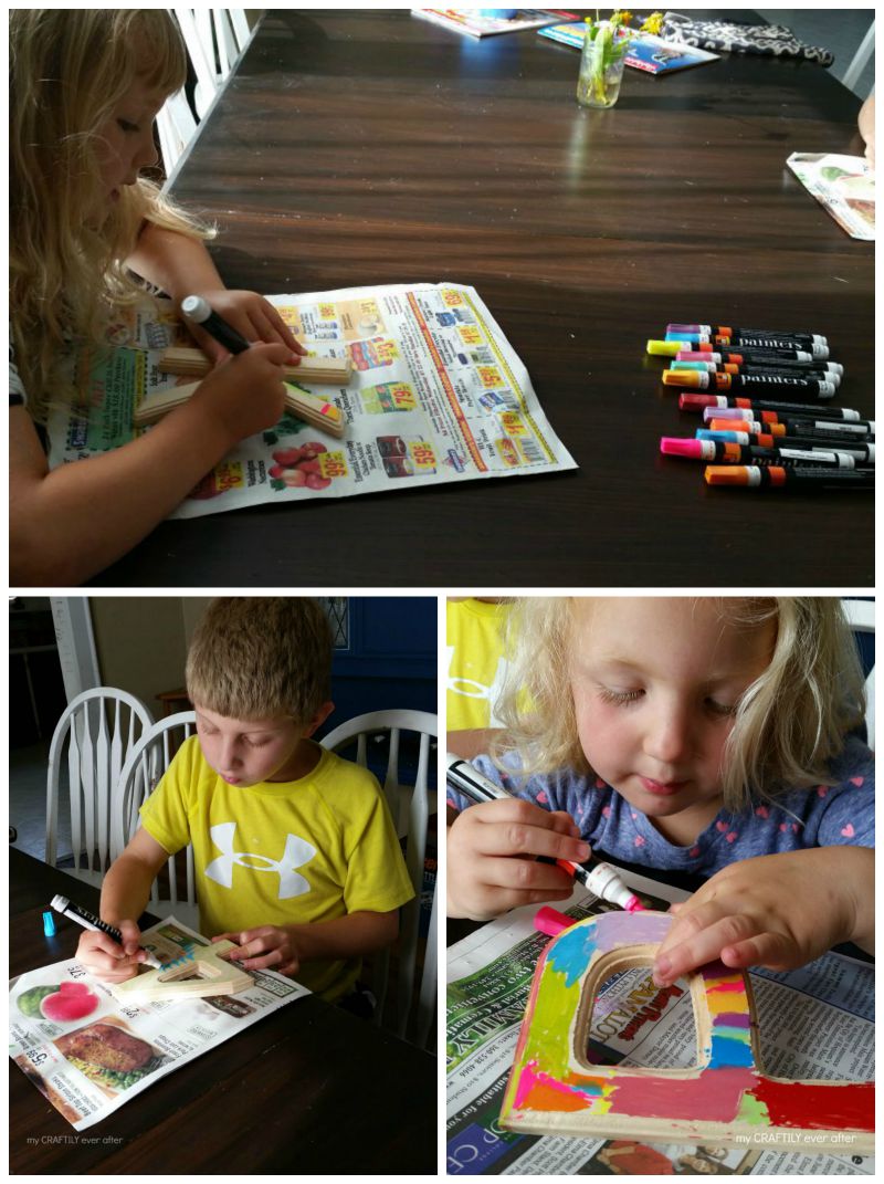 kids painting letters and numbers