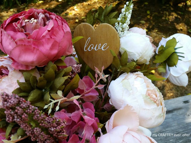 rustic floral arrangement with stained heart