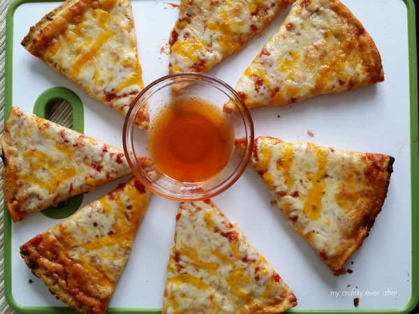 Red Baron classic crust 4 cheese pizza and a honey sriracha dipping sauce